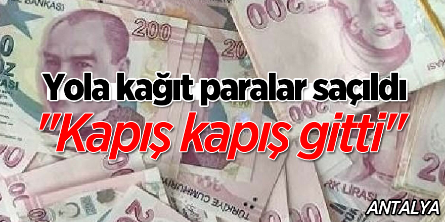 Yola kağıt paralar saçıldı