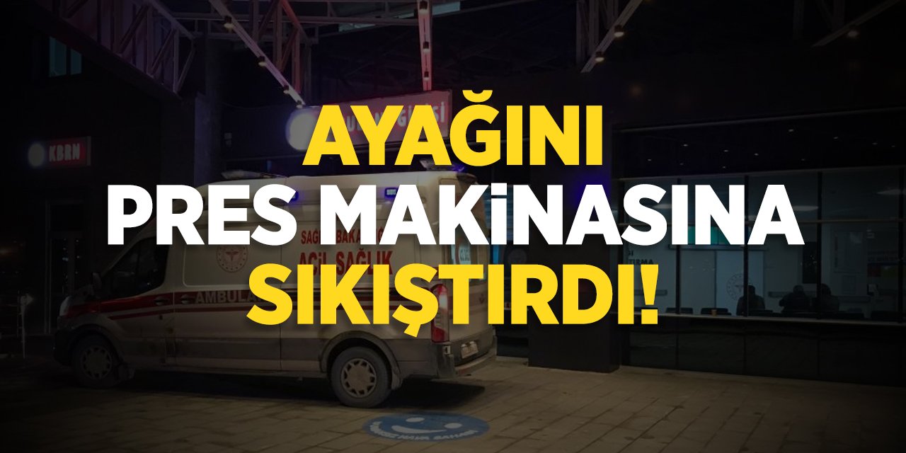 Ayağını pres makinasına sıkıştırdı!